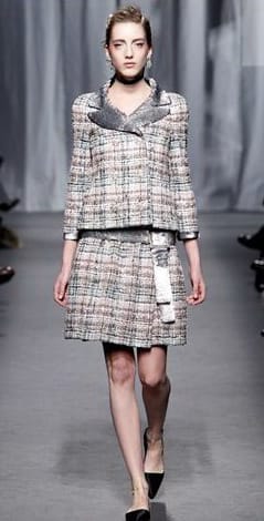 Карл Лагерфелд заедно с новите си модели